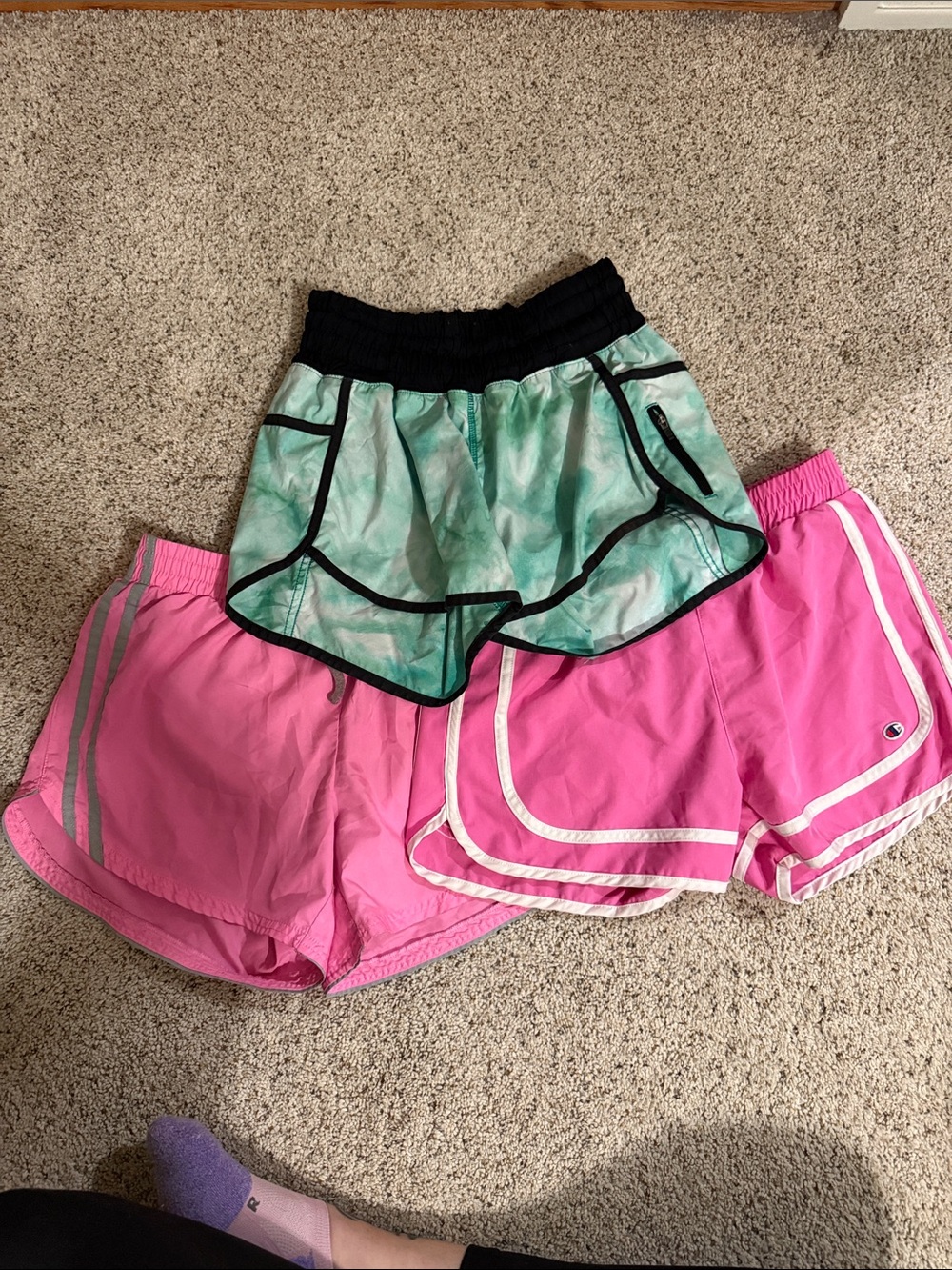 lululemon athletica mint green. Light pink dangling, dark pink champion. 3-$40